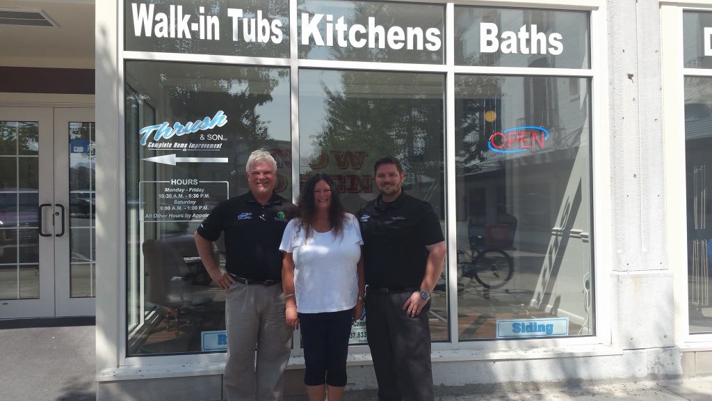 Team members of Thrush & Son family-owned home improvement company outside Troy Ohio showroom